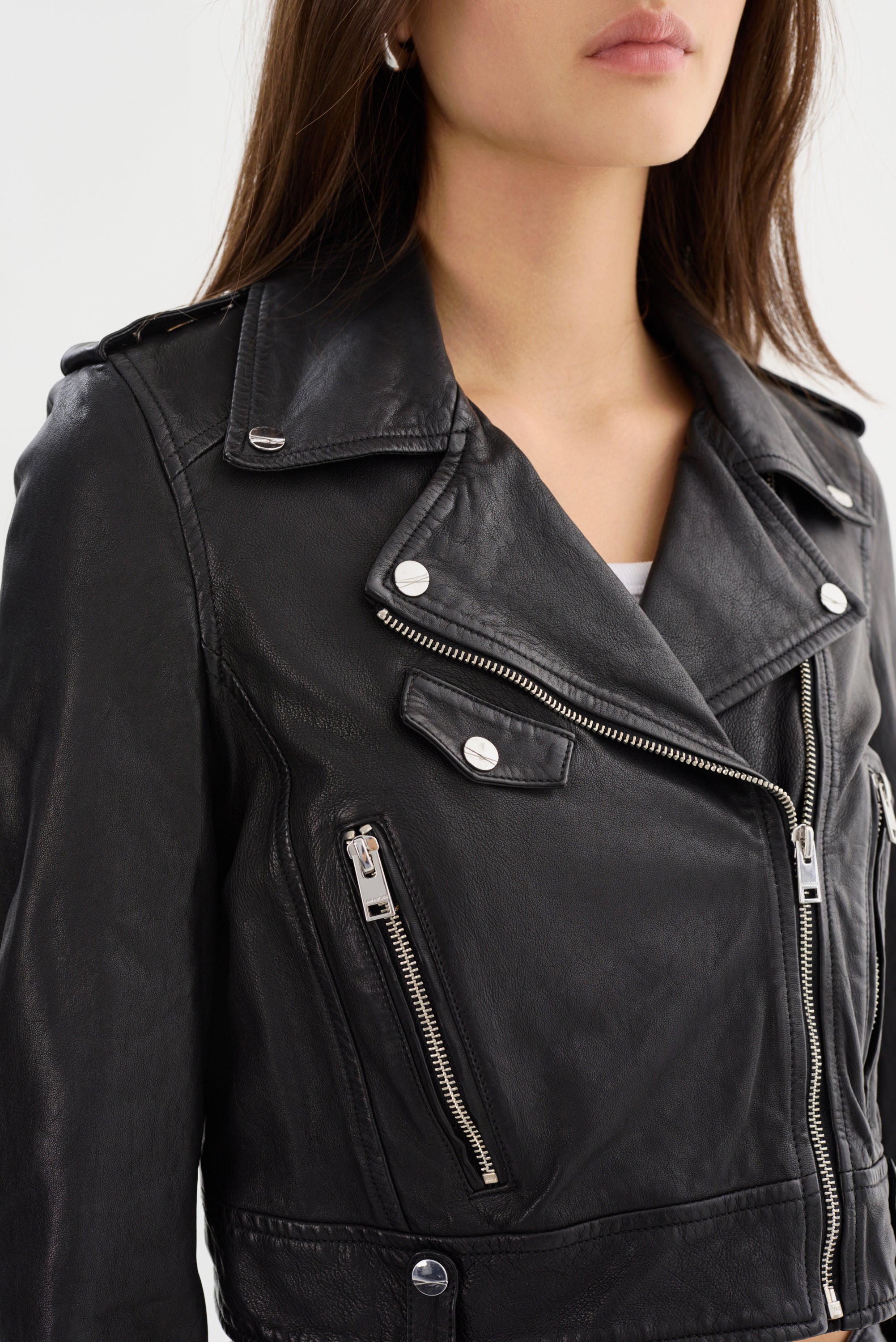 Black leather moto jacket with gold hardware on sale