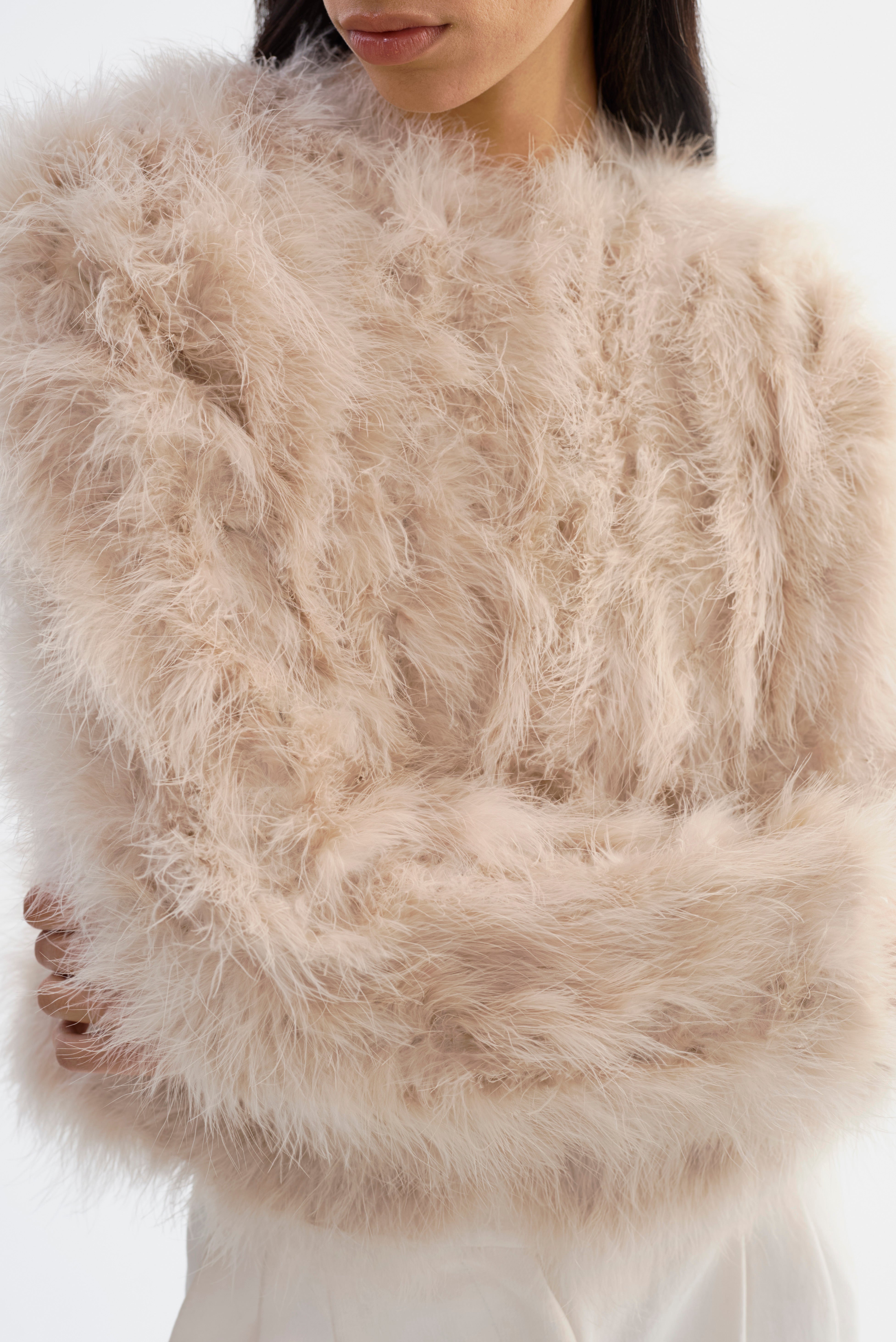 DEORA | Veste en plumes 