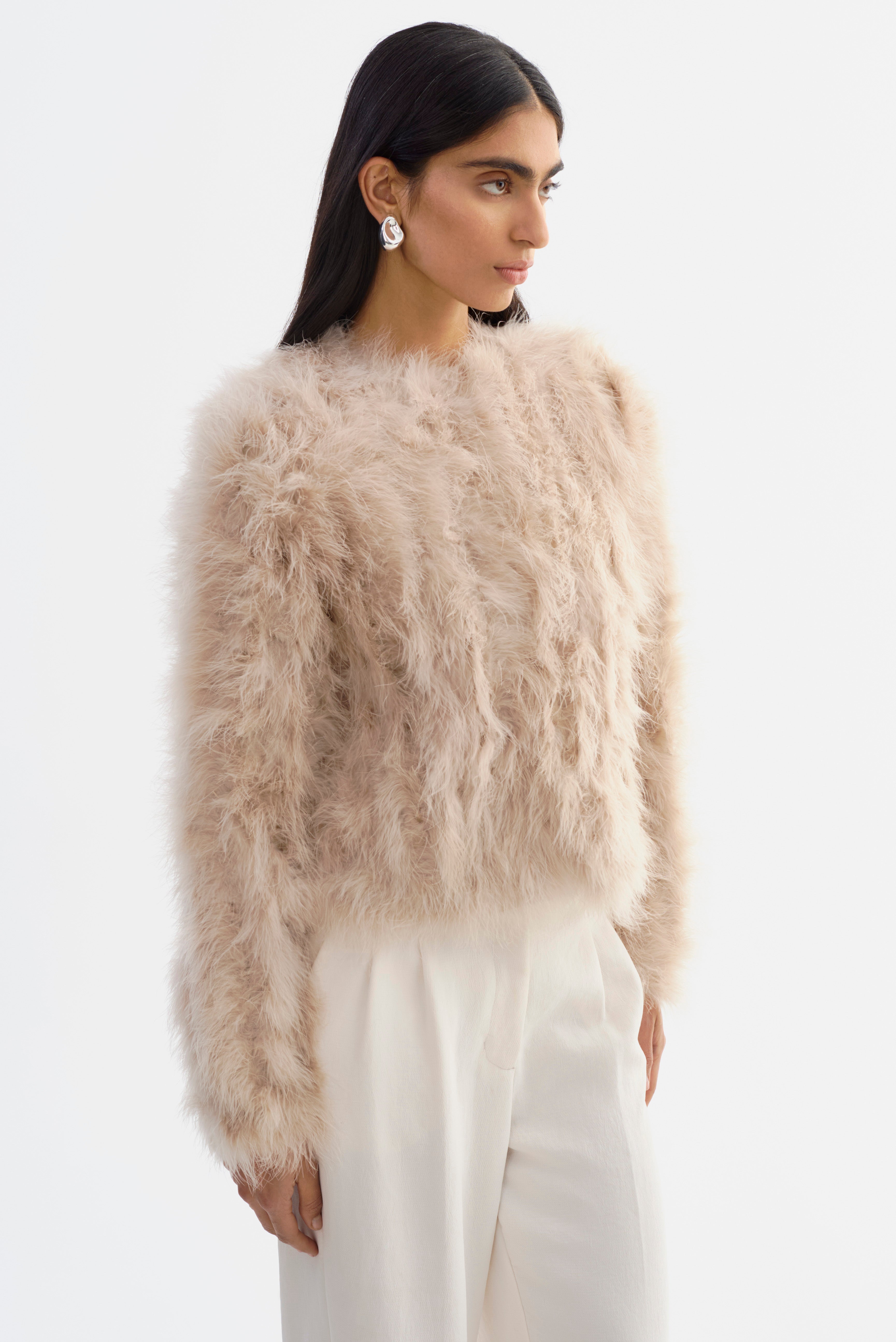 DEORA | Veste en plumes 
