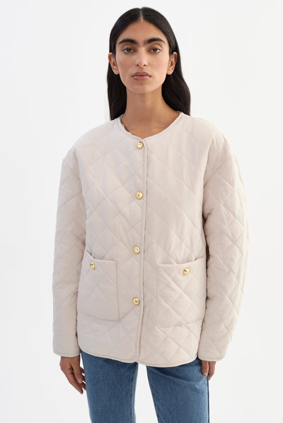 HERA | Collarless Quilted Jacket