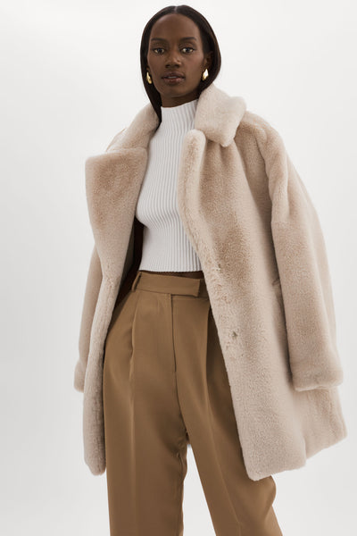 Long beige fur coat sales